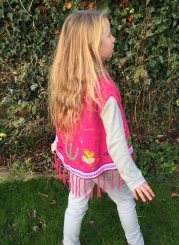 Fuchsia gebreide poncho uit peru