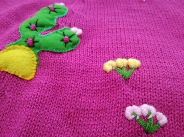 Gebreide meisje poncho fuchsia 2