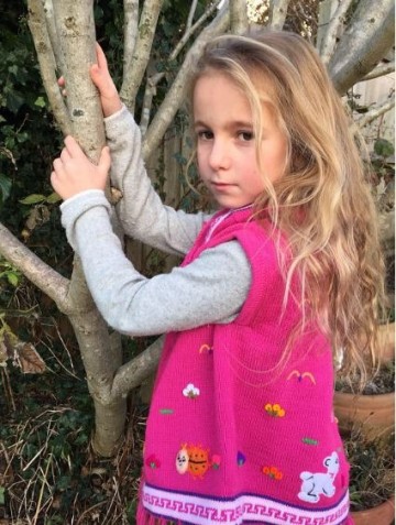 Gebreide meisje poncho