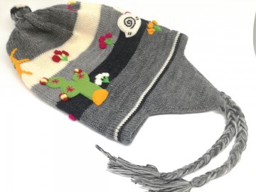 Wolle muts met pompn grijs